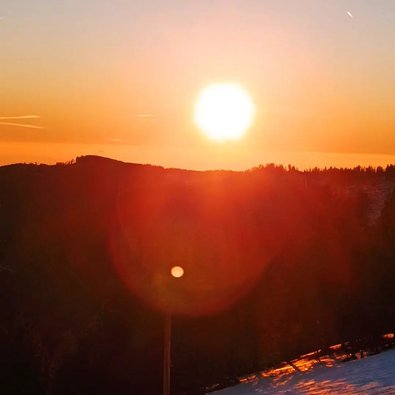 Untergehende orange Sonne