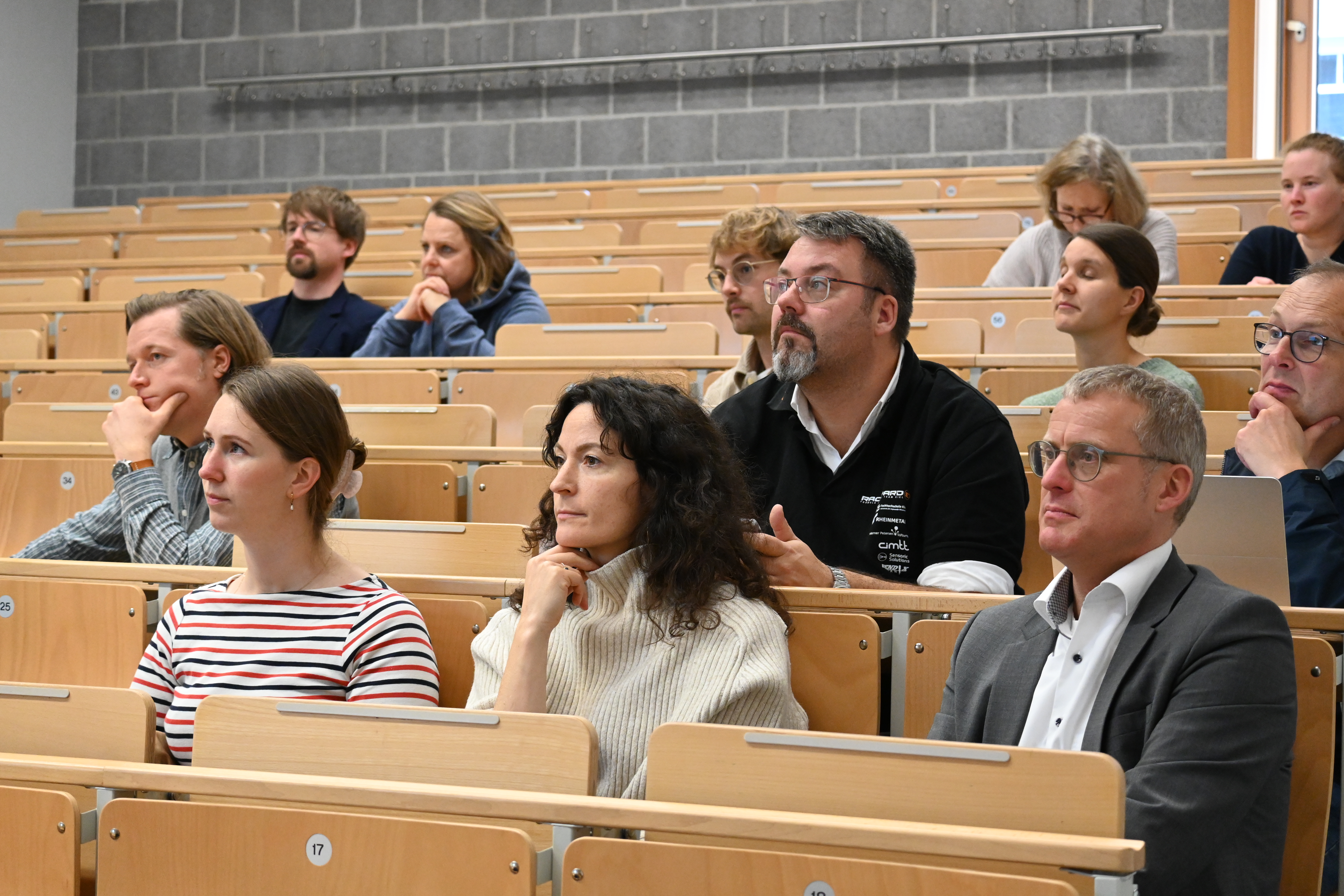 Menschen in einem Hörsaal