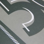 Die Ecke eines grauen Drucks.